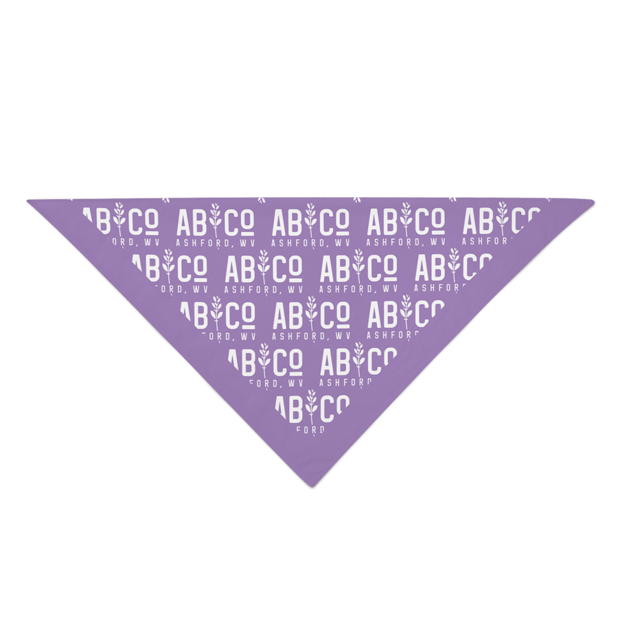 Purple bandana with the shortened Appalachian Botanical logo printed repeatedly folded into a triangle